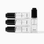 Set of Inglot nail polish bottles on a white background