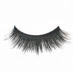 Pair of false eyelashes with a white card displaying the number 854 on a light gray background.