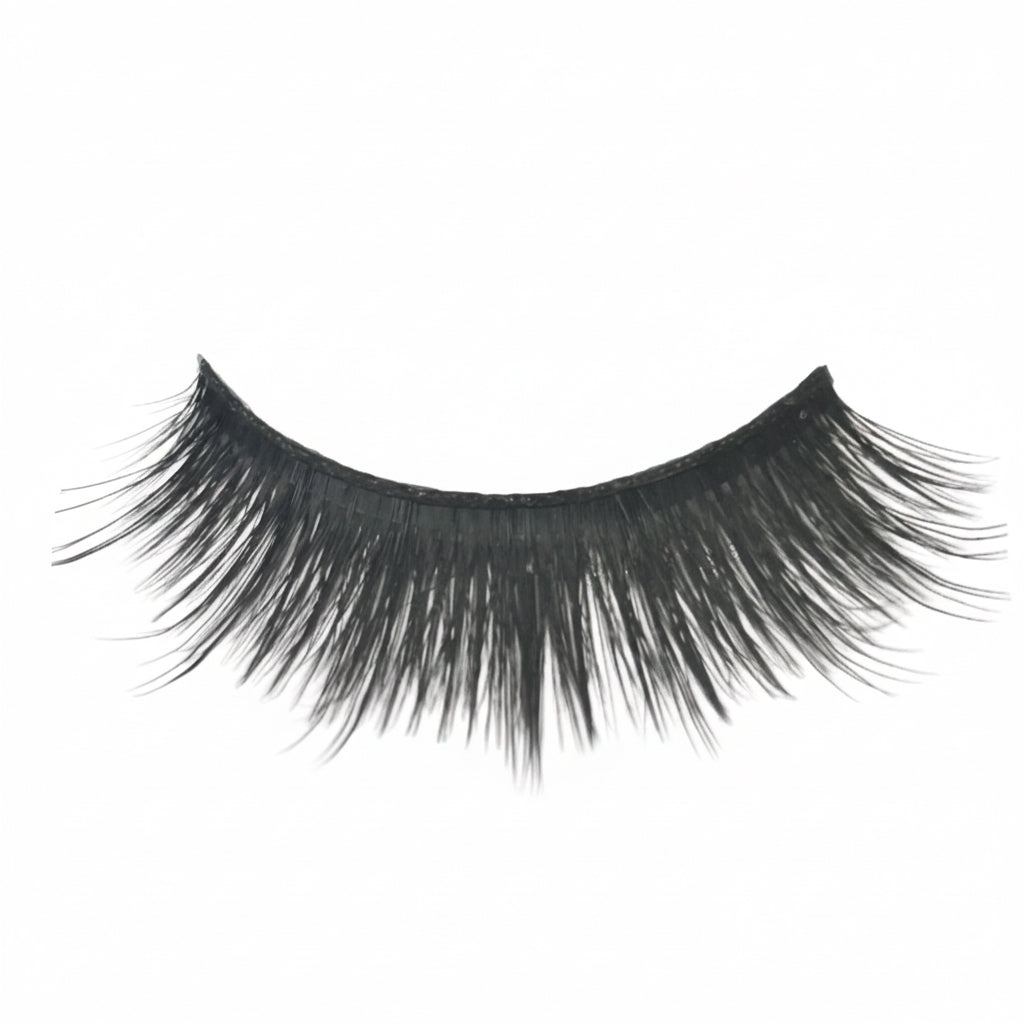 Pair of false eyelashes with a white card displaying the number 854 on a light gray background.