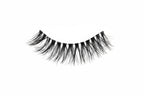 Pair of false eyelashes on a white tray with '817' printed on it against a black background.