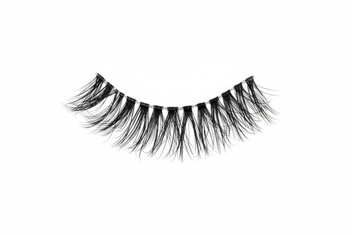 Pair of false eyelashes on a white tray with '817' printed on it against a black background.