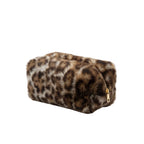 Leopard print pouch with a gold zipper on a marble surface