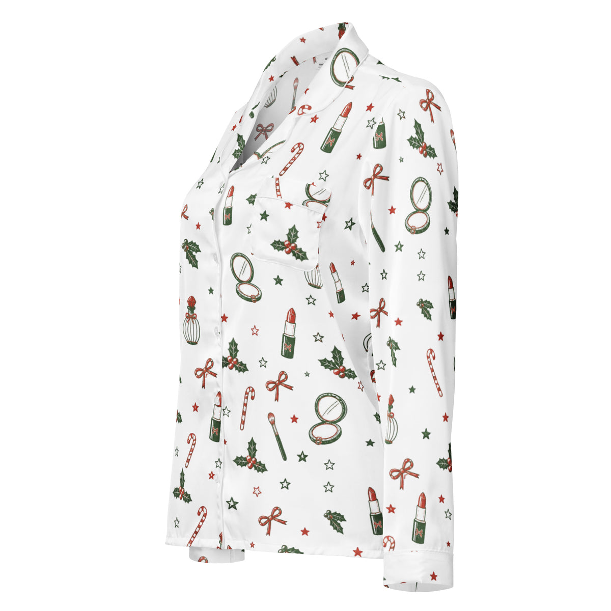 A white long-sleeve button-up shirt with a festive Christmas and holiday-themed print featuring red lipstick tubes, candy canes, green holly leaves, red bows, and small red stars.
