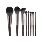 Set of makeup brushes with measurements on a white background