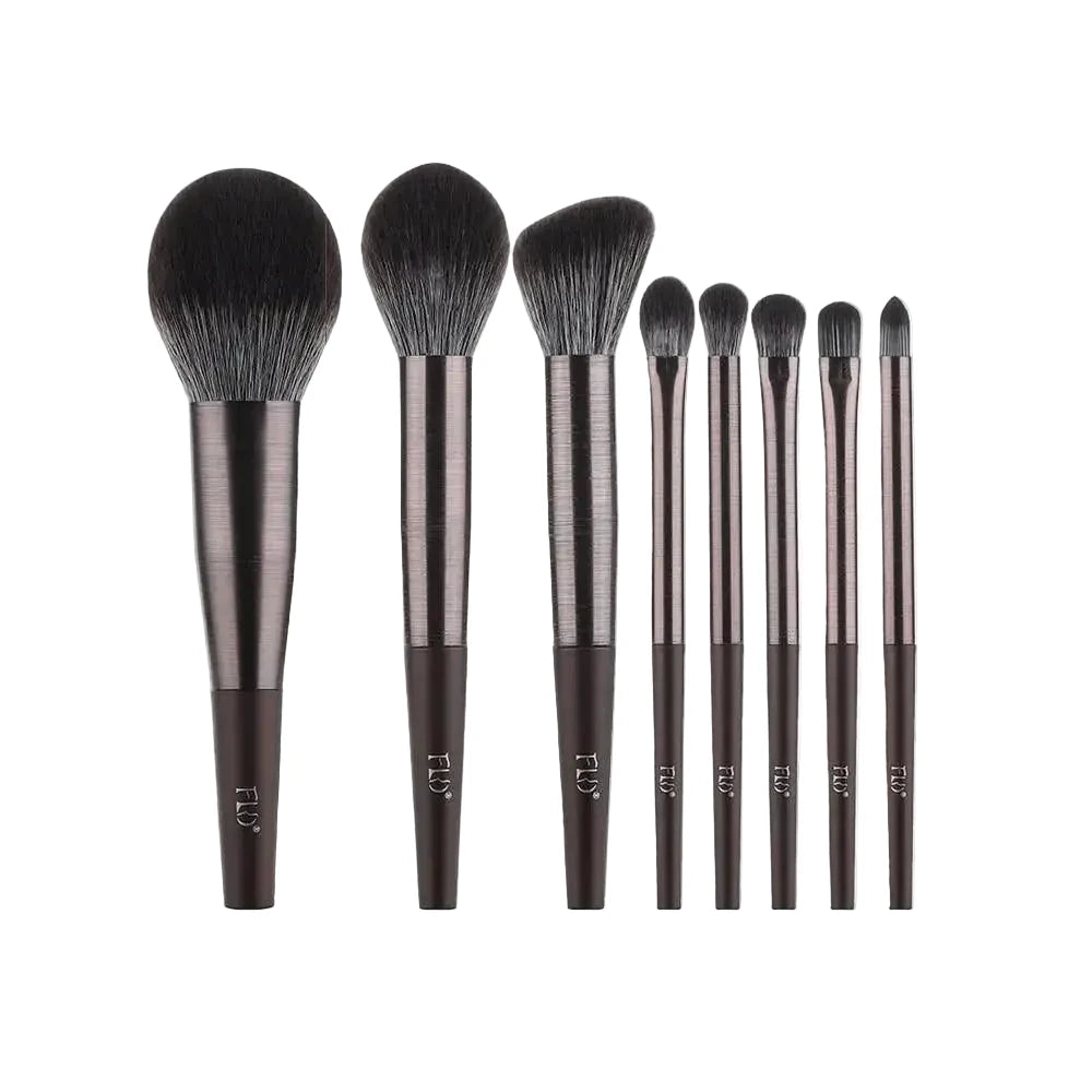 Set of makeup brushes with measurements on a white background