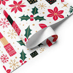 White wrapping paper with a festive Christmas pattern featuring red poinsettias, green holly leaves, gold snowflakes, and red-and-gold gift boxes, shown partially rolled on a white background.